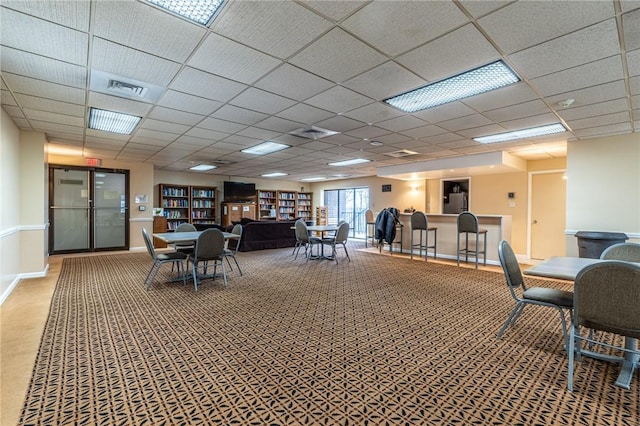 5600 Munhall Rd Unit 517, Squirrel Hill, PA 15217 - carpeted dining space with a paneled ceiling and baseboards