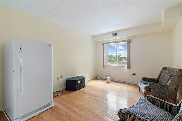 5600 Munhall Rd Unit 517, Squirrel Hill, PA 15217 - living area with light wood finished floors and baseboards