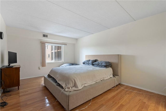 5600 Munhall Rd Unit 517, Squirrel Hill, PA 15217 - bedroom featuring light wood-type flooring and baseboards