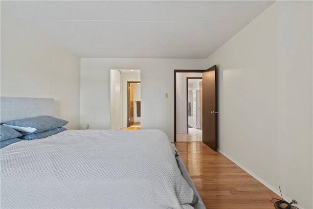 5600 Munhall Rd Unit 517, Squirrel Hill, PA 15217 - bedroom with light wood-style flooring and baseboards