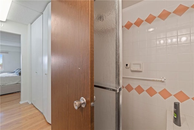 5600 Munhall Rd Unit 517, Squirrel Hill, PA 15217 - bathroom with wood finished floors and a shower