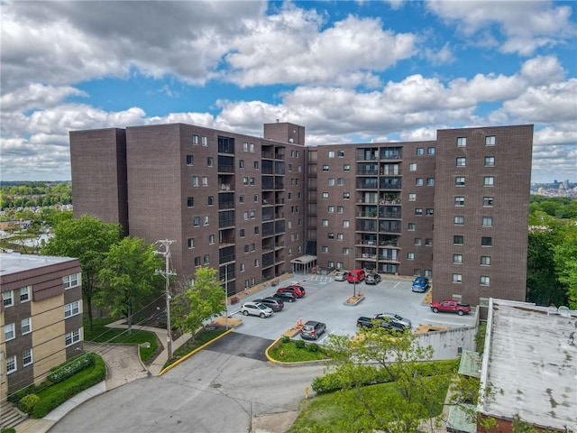 5600 Munhall Rd Unit 517, Squirrel Hill, PA 15217 - view of apartment building / complex featuring uncovered parking