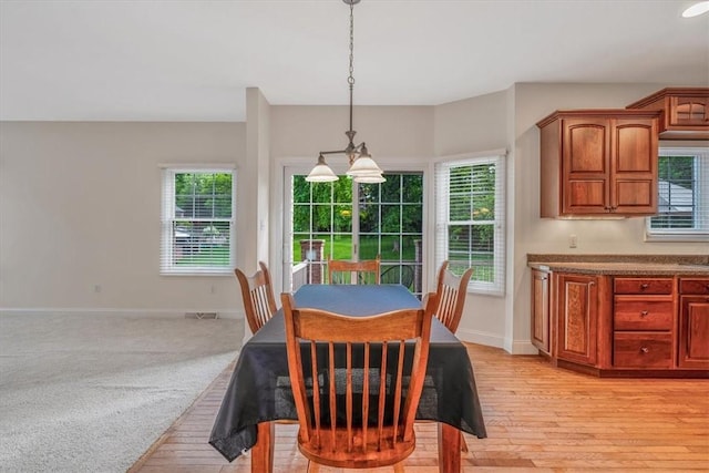 2108 Beams Run Rd, Jefferson Hills, PA 15025 - dining space with baseboards, plenty of natural light, and light wood finished floors