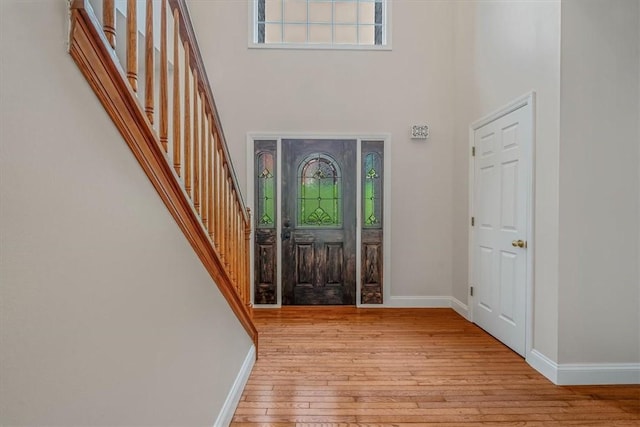 2108 Beams Run Rd, Jefferson Hills, PA 15025 - foyer with a high ceiling, light wood-type flooring, baseboards, and stairway