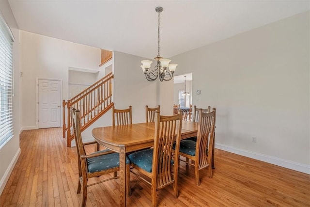 2108 Beams Run Rd, Jefferson Hills, PA 15025 - dining area with a chandelier, light wood finished floors, healthy amount of natural light, and baseboards