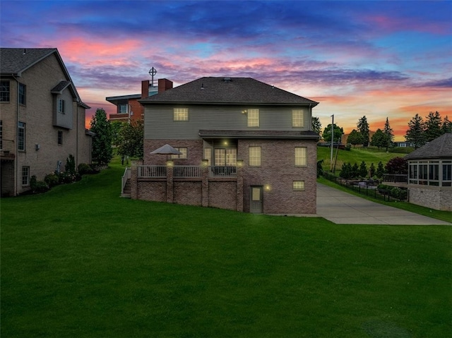 2108 Beams Run Rd, Jefferson Hills, PA 15025 - back of house at dusk featuring a yard