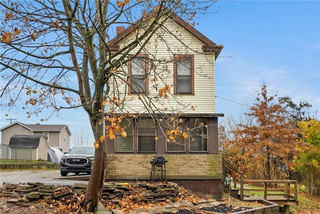 4974 Williamsport Rd, Elizabeth Twp/Boro, PA 15037 - view of front facade featuring brick siding and a chimney
