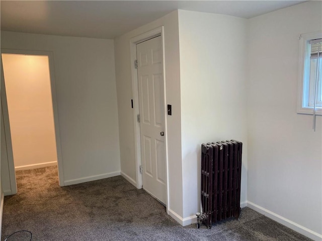 4974 Williamsport Rd, Elizabeth Twp/Boro, PA 15037 - empty room featuring radiator heating unit, carpet flooring, and baseboards