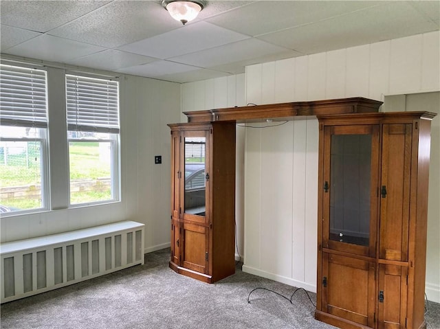 4974 Williamsport Rd, Elizabeth Twp/Boro, PA 15037 - unfurnished bedroom featuring radiator, carpet flooring, a drop ceiling, and a decorative wall