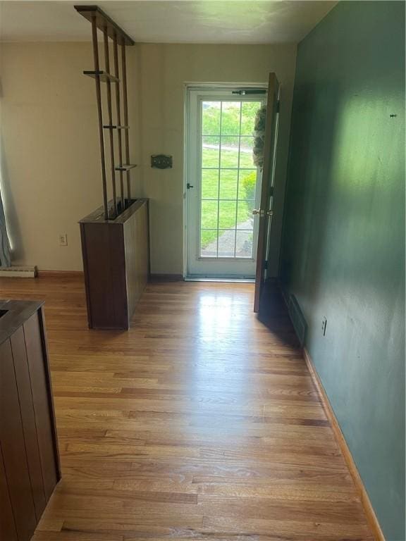 107 Pfaff Rd, Economy, PA 15005 - doorway to outside featuring wood finished floors and baseboards