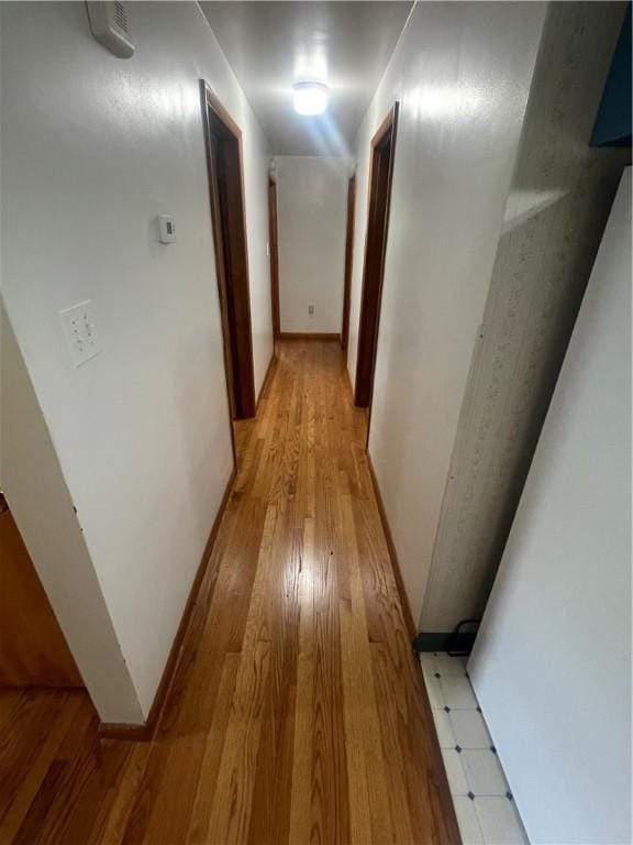 107 Pfaff Rd, Economy, PA 15005 - corridor featuring light wood finished floors and baseboards