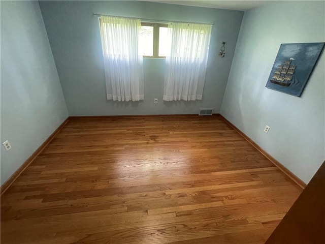 107 Pfaff Rd, Economy, PA 15005 - unfurnished room with wood finished floors and baseboards