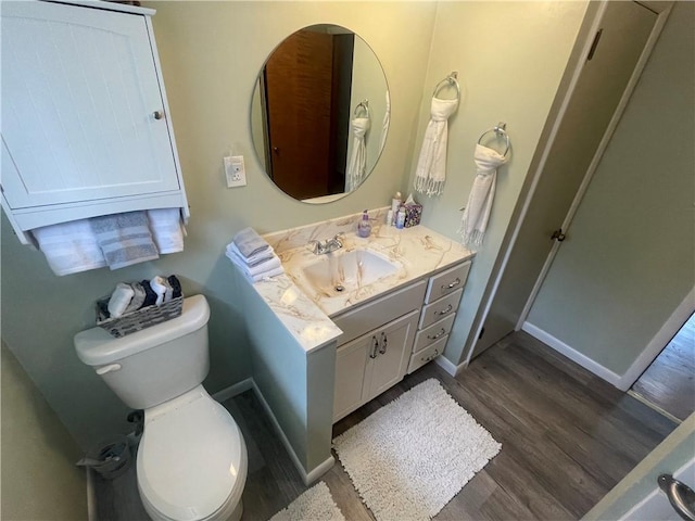 107 Pfaff Rd, Economy, PA 15005 - bathroom featuring wood finished floors, vanity, baseboards, and toilet