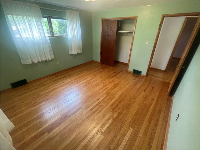 107 Pfaff Rd, Economy, PA 15005 - unfurnished bedroom with wood finished floors, a closet, and baseboards