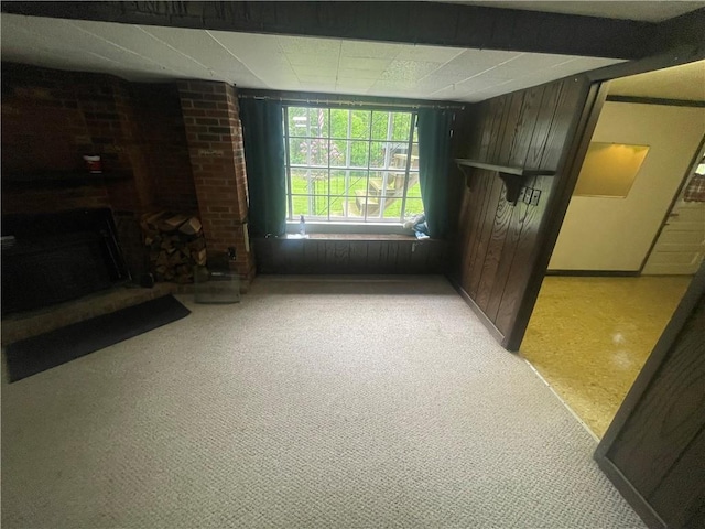 107 Pfaff Rd, Economy, PA 15005 - unfurnished living room with a brick fireplace and baseboards