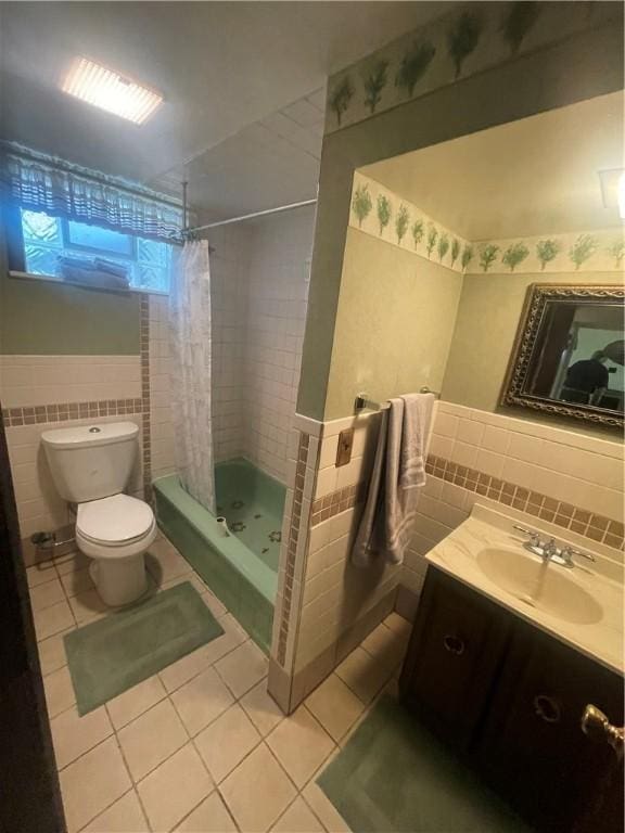 107 Pfaff Rd, Economy, PA 15005 - bathroom with tile walls, tile patterned flooring, toilet, vanity, and a wainscoted wall