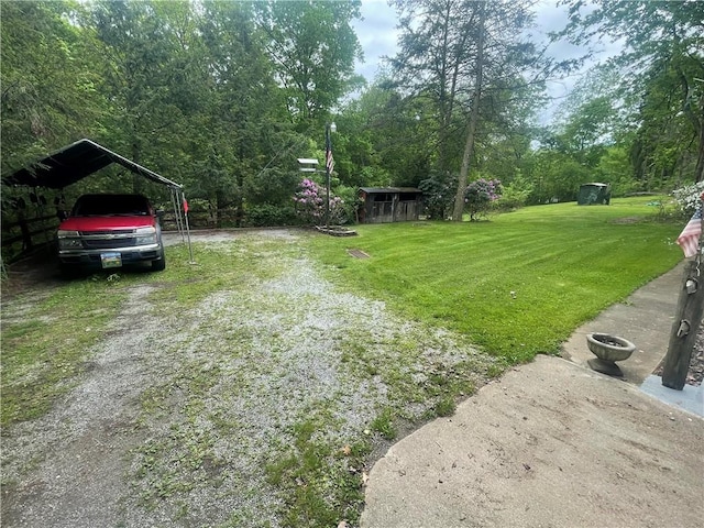 107 Pfaff Rd, Economy, PA 15005 - view of green lawn with a carport and driveway