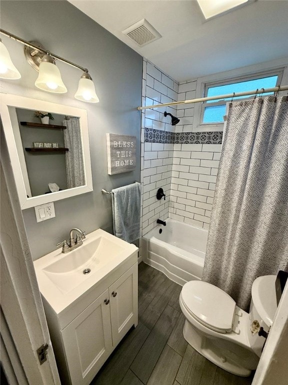 1701PLEASANT Pleasant, West Mifflin, PA 15122 - full bathroom with toilet, shower / bath combination with curtain, wood finished floors, and vanity