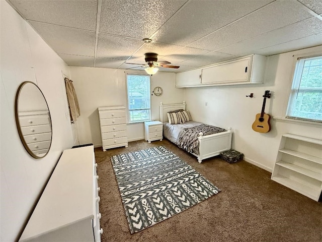 1701PLEASANT Pleasant, West Mifflin, PA 15122 - bedroom featuring dark carpet, a paneled ceiling, a ceiling fan, and baseboards