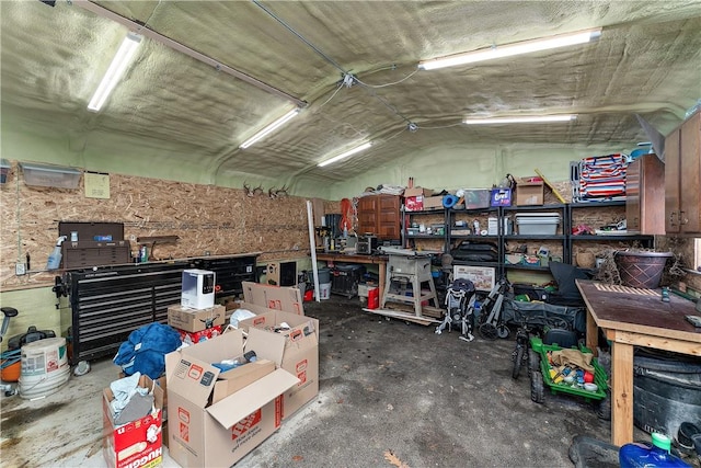 garage with a workshop area