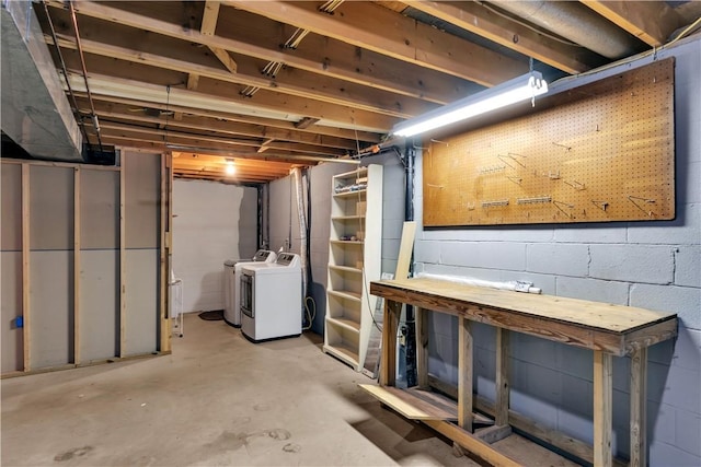 unfinished basement featuring separate washer and dryer