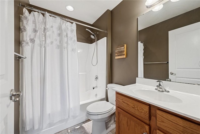bathroom featuring toilet, tile patterned flooring, shower / bath combo, and vanity