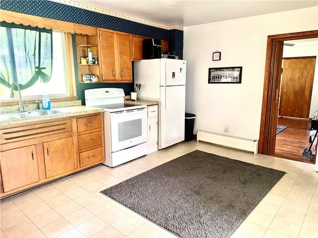 kitchen with a baseboard radiator, white appliances, a sink, open shelves, and light tile patterned flooring