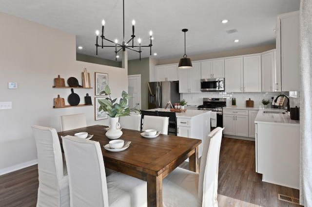422 Hawthorn Hill Dr, Canonsburg, PA 15317 - dining room with a chandelier, dark wood-style floors, and recessed lighting