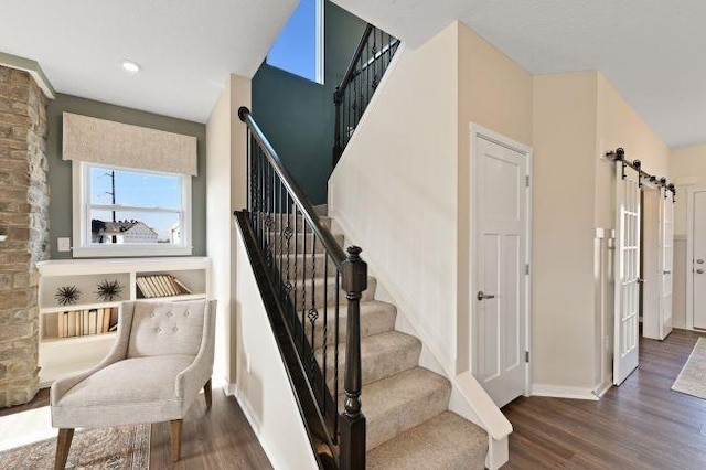 422 Hawthorn Hill Dr, Canonsburg, PA 15317 - stairs with a barn door and wood finished floors