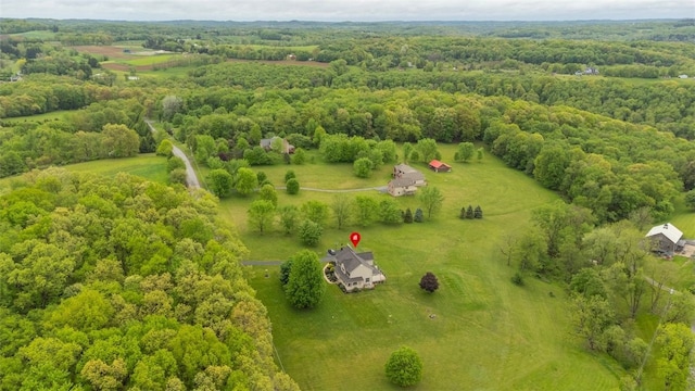 overview of rural landscape with a heavily wooded area