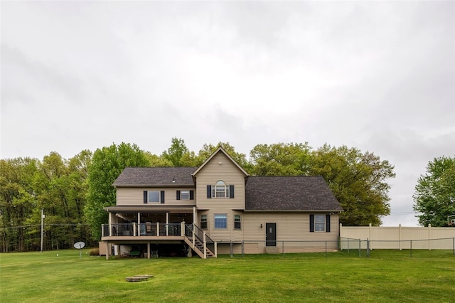 back of house featuring a deck and stairs