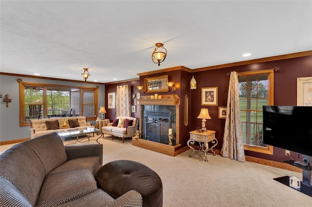 living room with carpet flooring, crown molding, a premium fireplace, baseboards, and recessed lighting