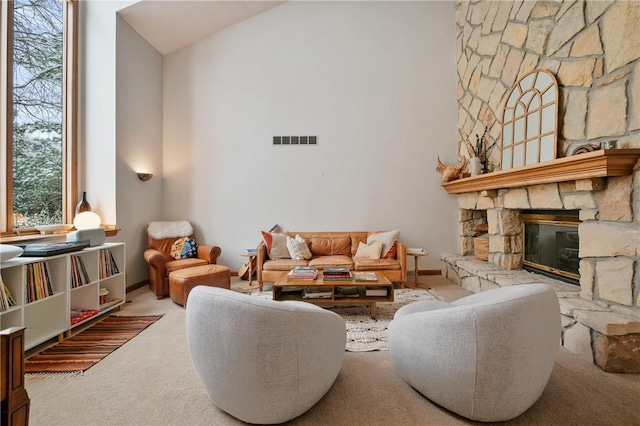 4616 Windbrook, Murrysville, PA 15668 - carpeted living area with a stone fireplace and high vaulted ceiling