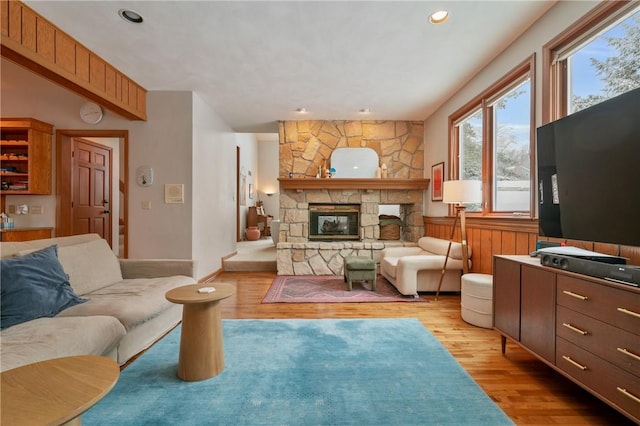 4616 Windbrook, Murrysville, PA 15668 - living room with light wood-style floors, a fireplace, and recessed lighting
