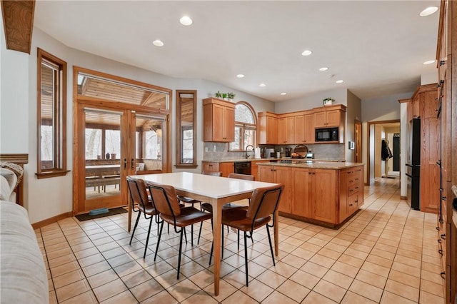 4616 Windbrook, Murrysville, PA 15668 - dining area featuring recessed lighting, light tile patterned floors, baseboards, and french doors