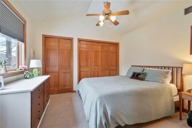 4616 Windbrook, Murrysville, PA 15668 - bedroom featuring light carpet, two closets, ceiling fan, and high vaulted ceiling
