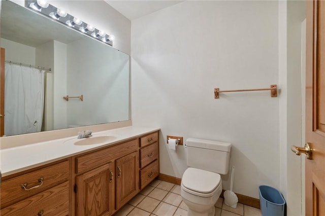 4616 Windbrook, Murrysville, PA 15668 - bathroom featuring tile patterned flooring, toilet, baseboards, and vanity