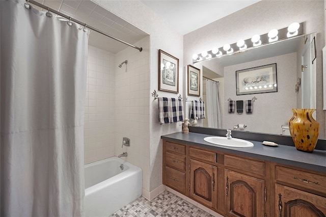 bathroom featuring shower / bath combination with curtain, vanity, and tile patterned flooring