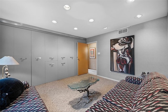 carpeted living room featuring recessed lighting