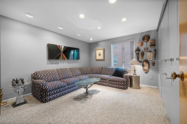 living area with carpet floors, baseboards, and recessed lighting