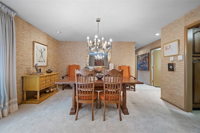 dining area with light colored carpet, a chandelier, and recessed lighting