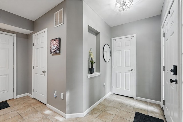 113 Lewisham Rd, Cranberry Twp, PA 16066 - entrance foyer featuring light tile patterned floors and baseboards