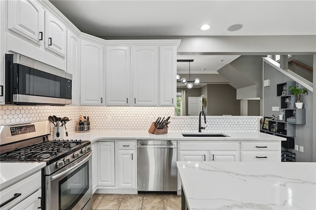 113 Lewisham Rd, Cranberry Twp, PA 16066 - kitchen with appliances with stainless steel finishes, a sink, backsplash, white cabinetry, and recessed lighting
