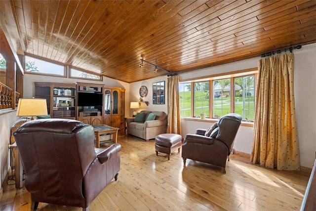 living area featuring wooden ceiling, light wood-style floors, and vaulted ceiling