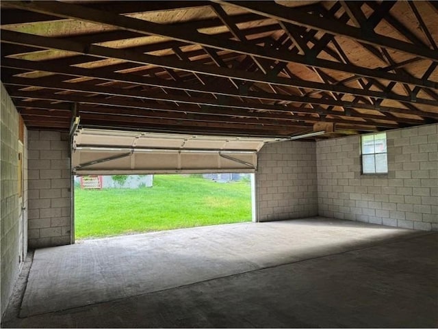 garage featuring concrete block wall
