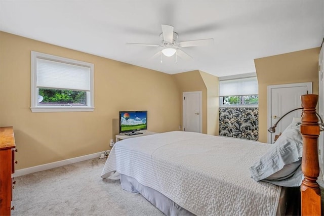 bedroom featuring baseboards, carpet flooring, and a ceiling fan