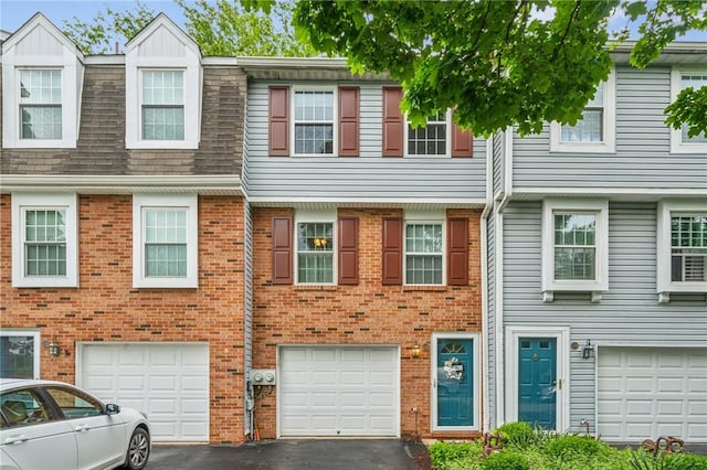 226 Green Ct, Castle Shannon, PA 15234 - view of property featuring driveway, an attached garage, brick siding, and roof with shingles