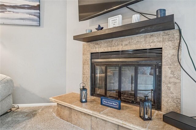 226 Green Ct, Castle Shannon, PA 15234 - detailed view of a tile fireplace, carpet, and baseboards