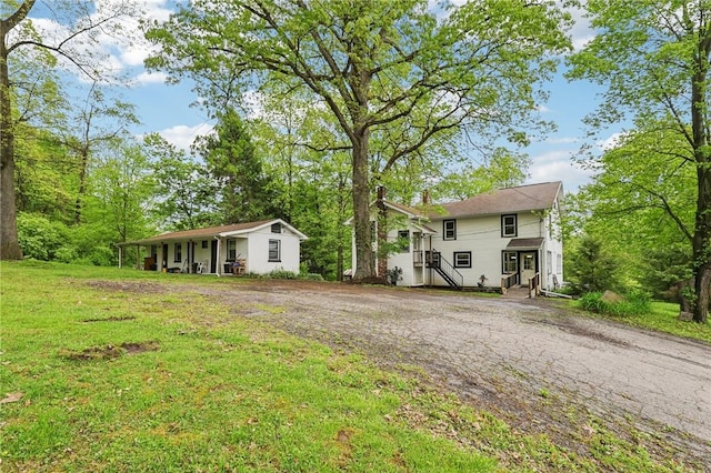 1770 Perry Hwy, Muddy Creek Twp, PA 16051 - view of front facade featuring a front yard and driveway