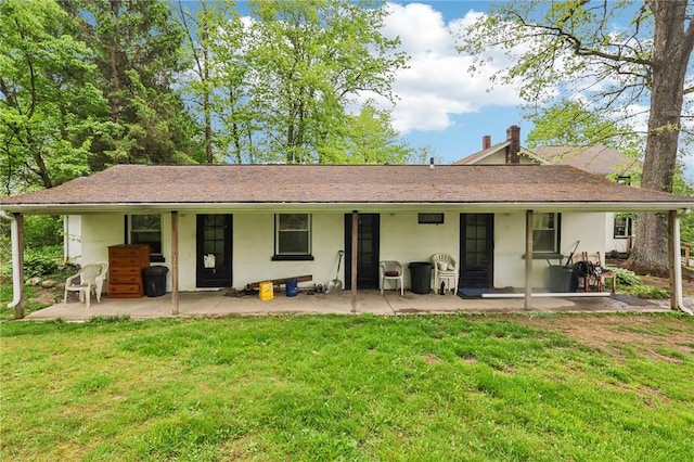1770 Perry Hwy, Muddy Creek Twp, PA 16051 - rear view of property featuring a patio, a yard, and stucco siding